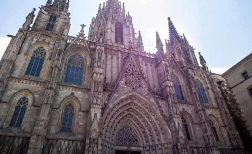 The gothic west front of Barcelona Cathedral, spires and carved portal